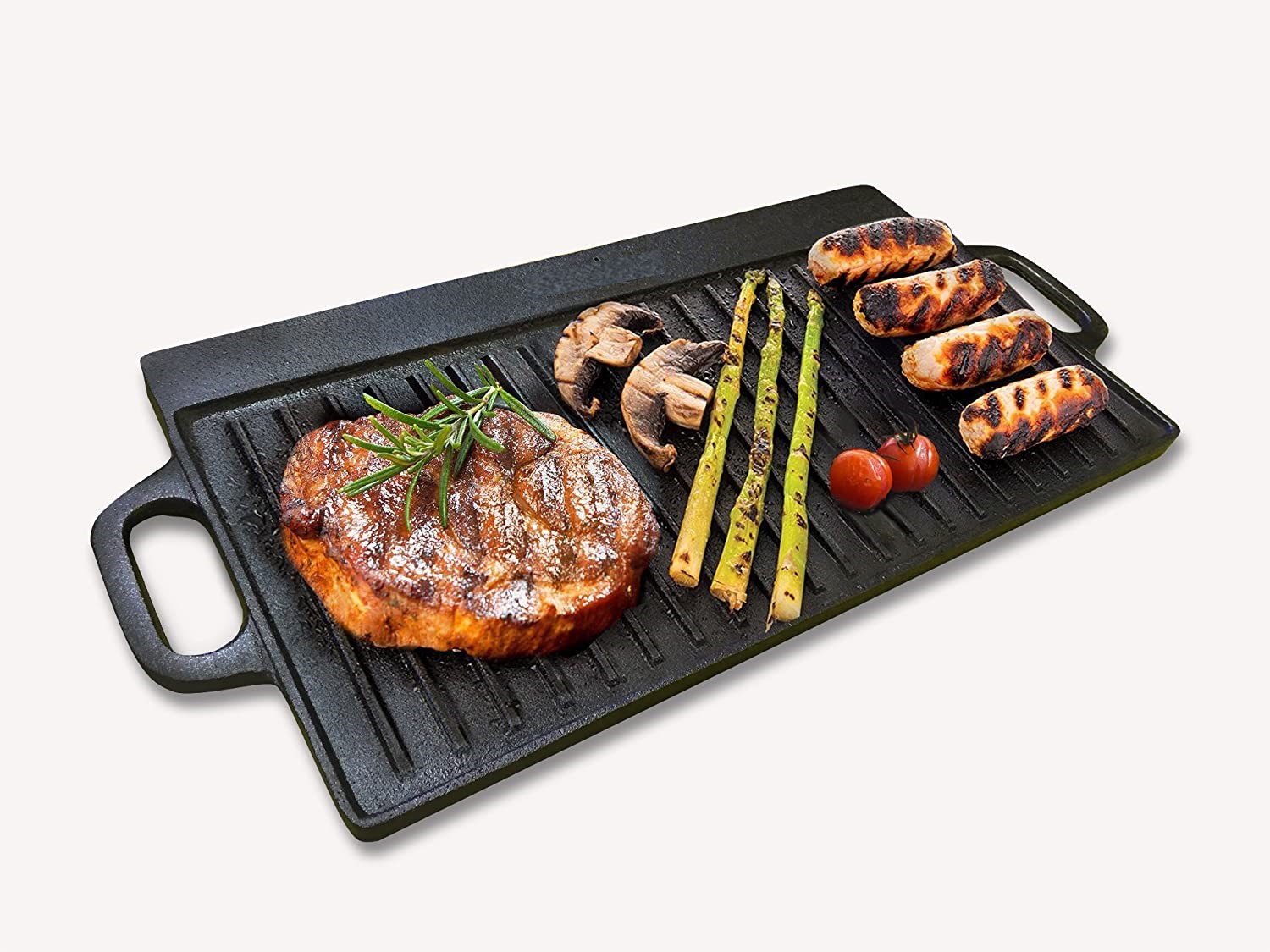 This is a picture of a cast iron hotplate ribbed side cooking steak and sausages